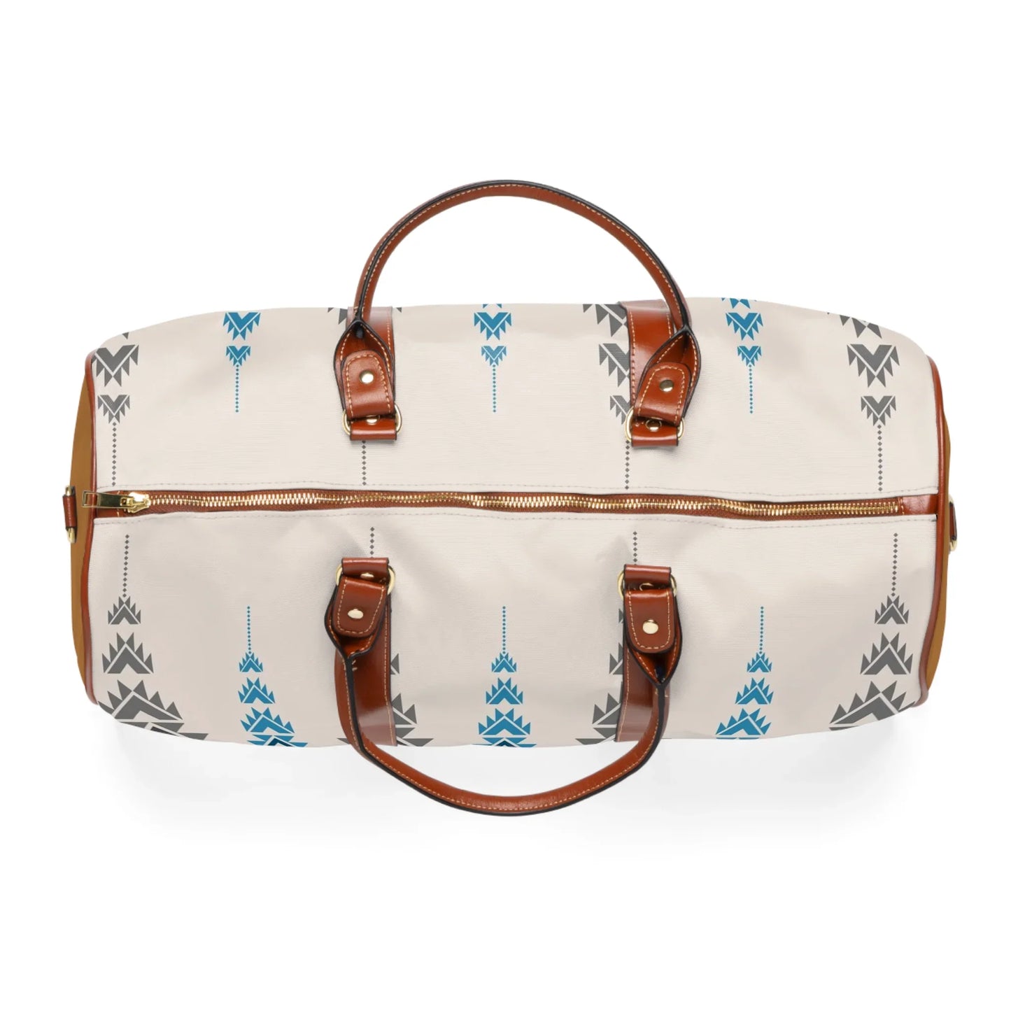 Beige travel duffel bag with blue and gray geometric patterns and brown leather handles