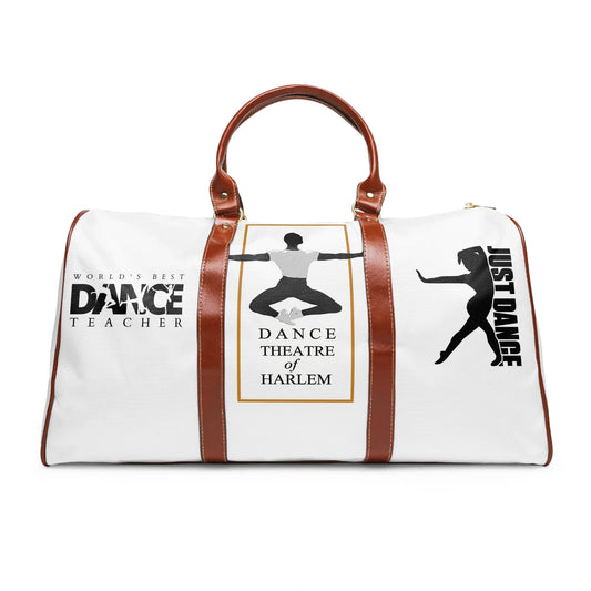 White dance duffel bag with brown leather handles featuring dance teacher and Dance Theatre of Harlem logos