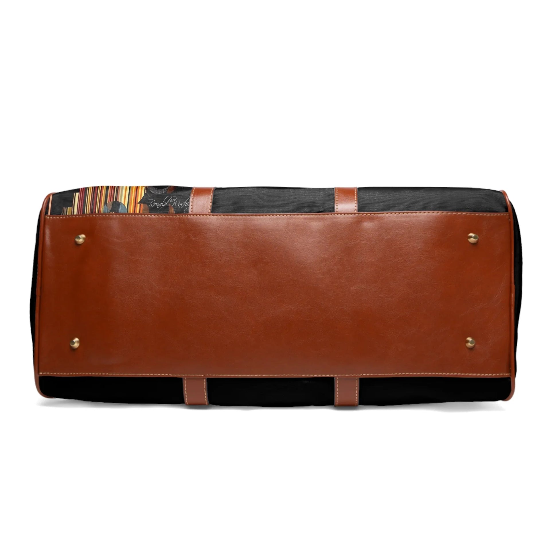 Bottom view of black and brown leather travel bag with metal protectors and colorful patterned interior
