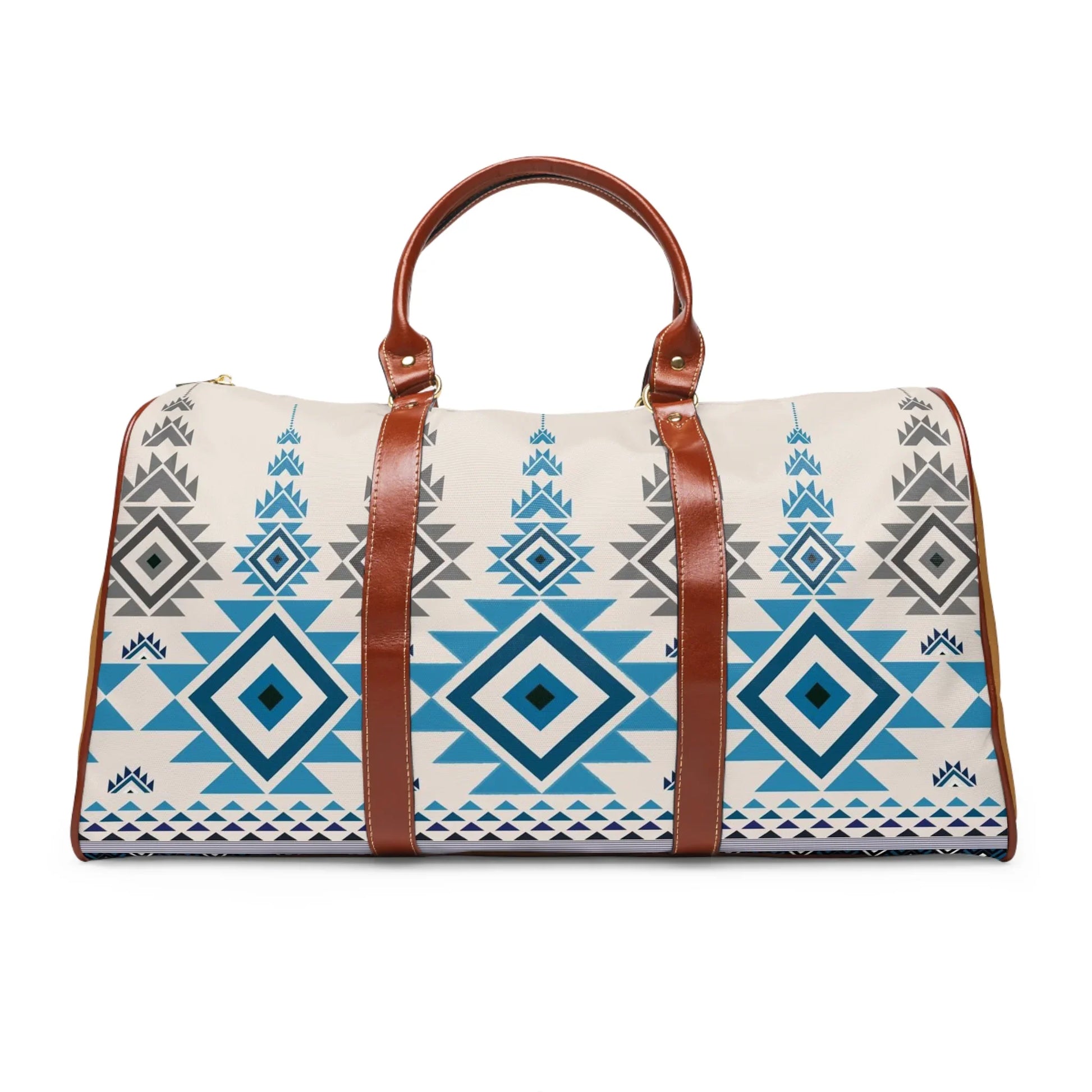 Travel duffel bag with blue and gray geometric tribal pattern and brown leather handles